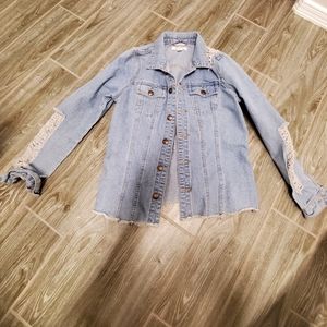 Light wash demin jacket distressed